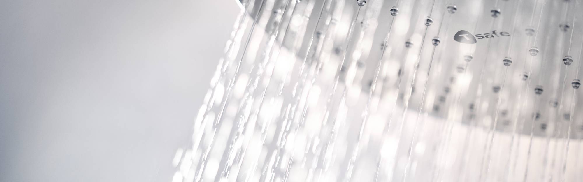 Water running from the T-safe Overhead Shower Filter